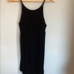Black velvet slip dress with open back